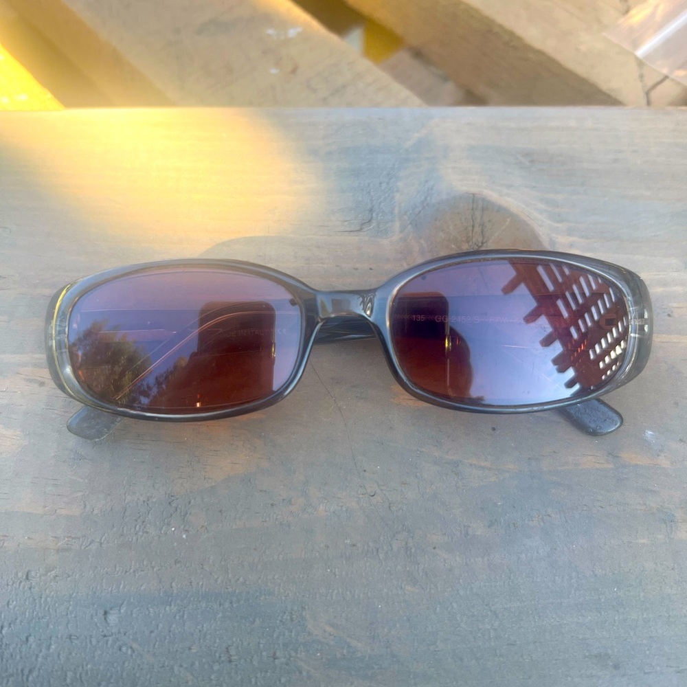 Gucci Black Frame Sunglasses with Brown Gradient Lenses
